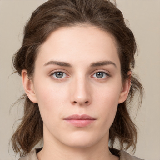 Neutral white young-adult female with medium  brown hair and grey eyes