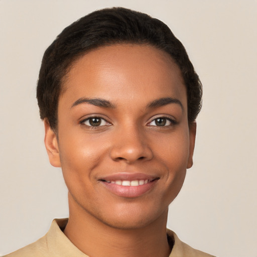 Joyful latino young-adult female with short  brown hair and brown eyes