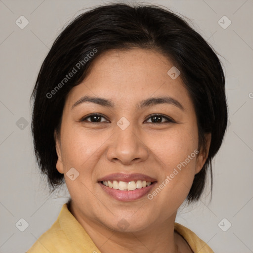 Joyful white young-adult female with medium  brown hair and brown eyes