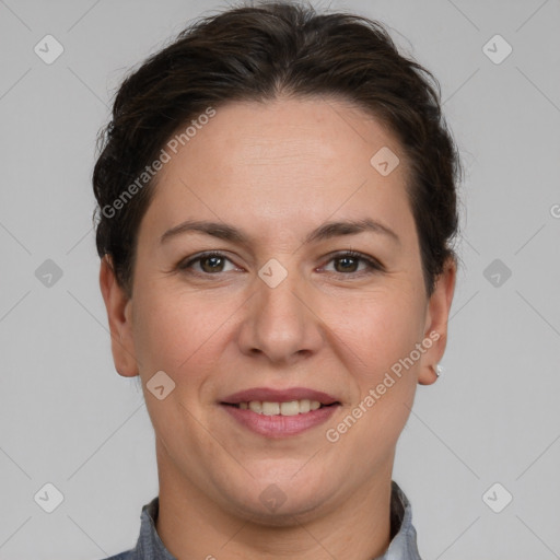 Joyful white adult female with short  brown hair and brown eyes