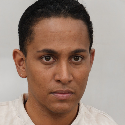 Neutral black young-adult male with short  brown hair and brown eyes