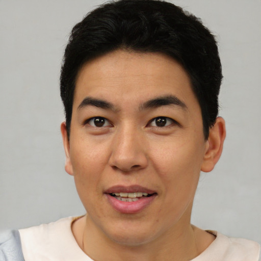 Joyful asian young-adult male with short  black hair and brown eyes