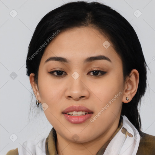 Joyful asian young-adult female with medium  black hair and brown eyes
