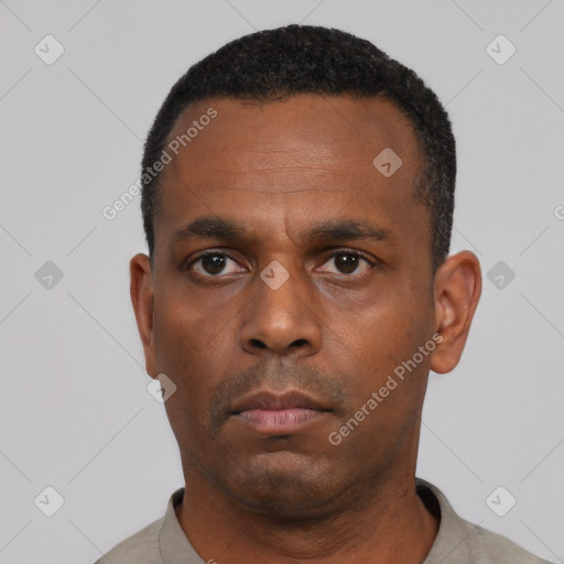 Neutral black adult male with short  black hair and brown eyes
