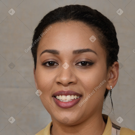 Joyful latino young-adult female with short  brown hair and brown eyes