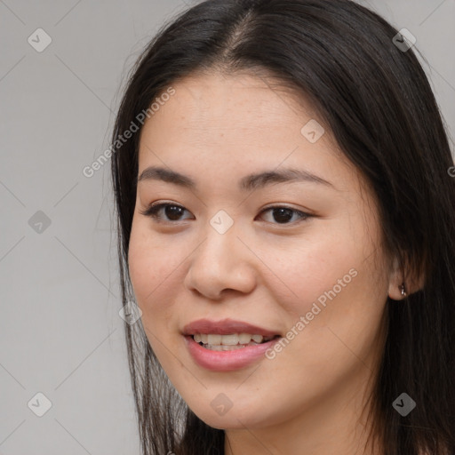 Joyful asian young-adult female with long  brown hair and brown eyes