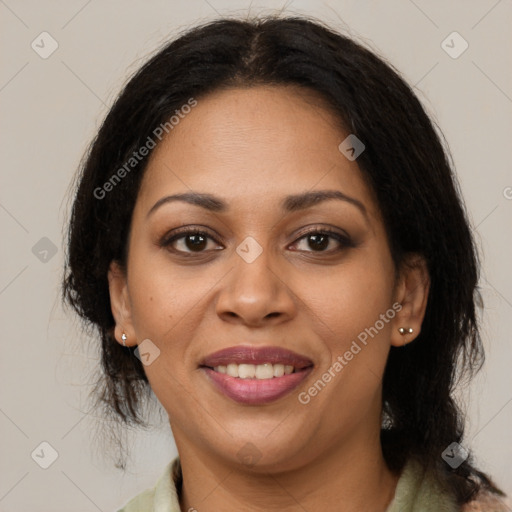 Joyful latino young-adult female with medium  brown hair and brown eyes