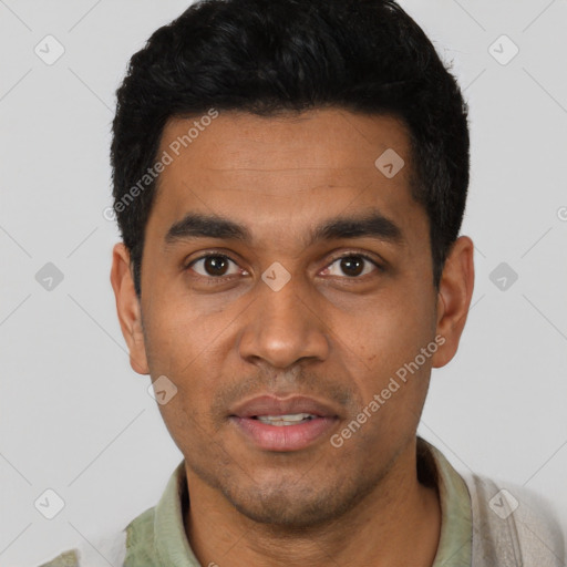 Joyful latino young-adult male with short  black hair and brown eyes