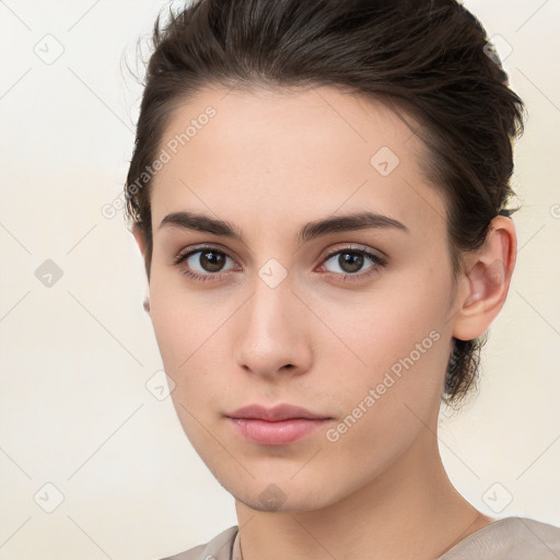 Neutral white young-adult female with medium  brown hair and brown eyes