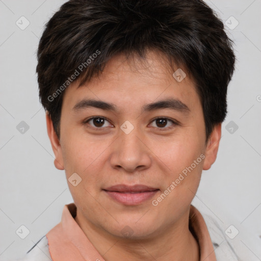 Joyful asian young-adult male with short  brown hair and brown eyes