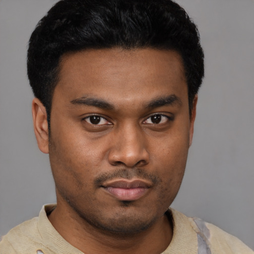 Neutral latino young-adult male with short  brown hair and brown eyes