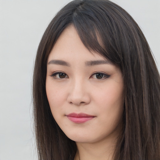 Neutral asian young-adult female with long  brown hair and brown eyes