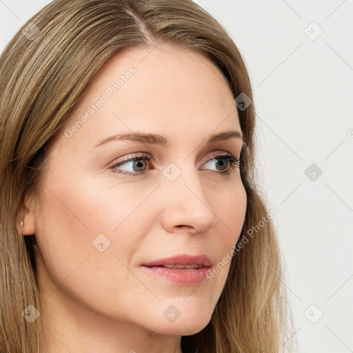 Joyful white young-adult female with long  brown hair and green eyes