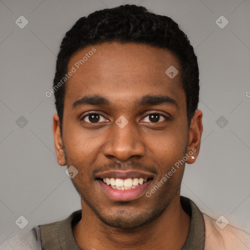 Joyful black young-adult male with short  black hair and brown eyes