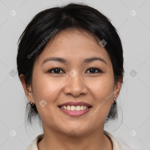 Joyful asian young-adult female with medium  brown hair and brown eyes