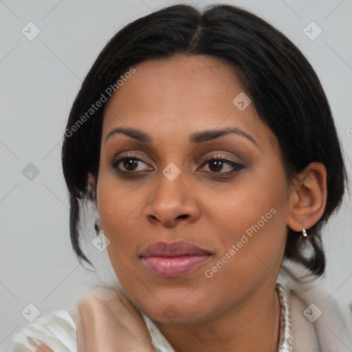 Joyful black young-adult female with medium  brown hair and brown eyes