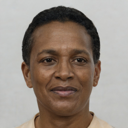 Neutral latino adult female with short  black hair and brown eyes