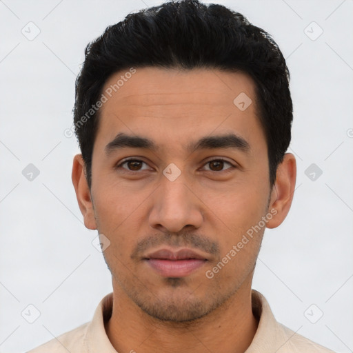 Neutral latino young-adult male with short  black hair and brown eyes