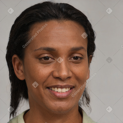 Joyful black young-adult female with medium  brown hair and brown eyes