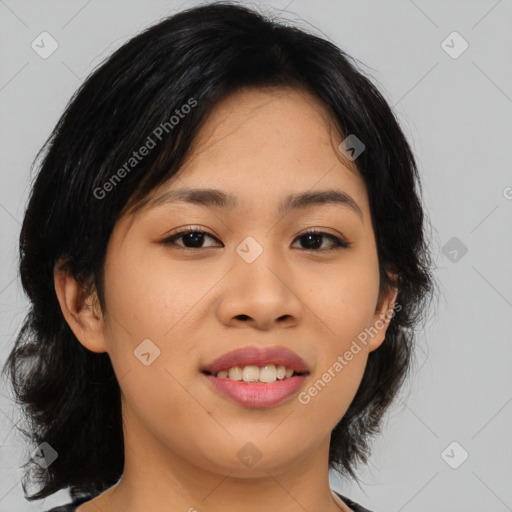 Joyful asian young-adult female with medium  black hair and brown eyes