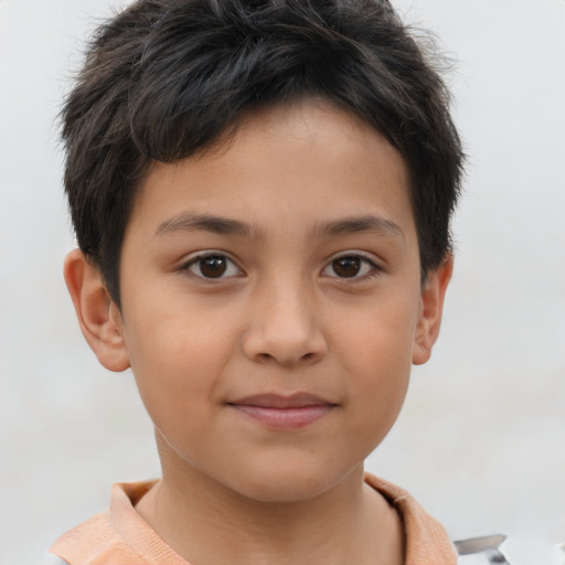 Joyful white child female with short  brown hair and brown eyes
