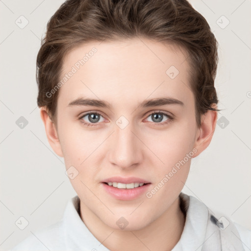 Joyful white young-adult female with short  brown hair and grey eyes