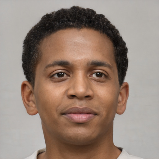 Neutral black young-adult male with short  brown hair and brown eyes
