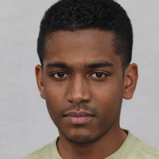 Neutral black young-adult male with short  brown hair and brown eyes