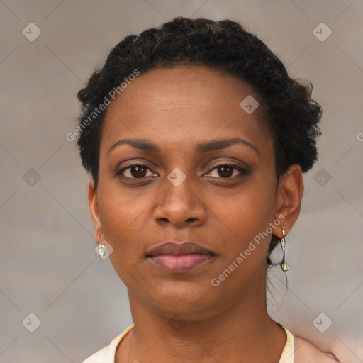 Neutral black young-adult female with short  brown hair and brown eyes