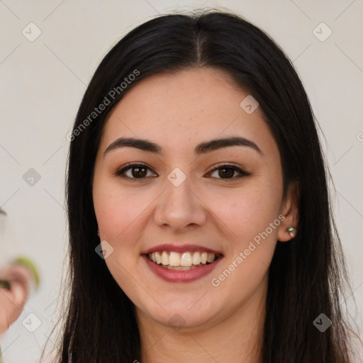 Joyful asian young-adult female with long  brown hair and brown eyes