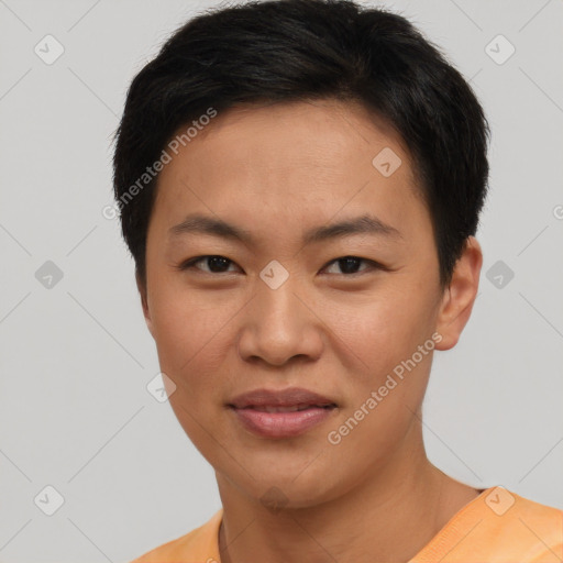 Joyful asian young-adult female with short  black hair and brown eyes