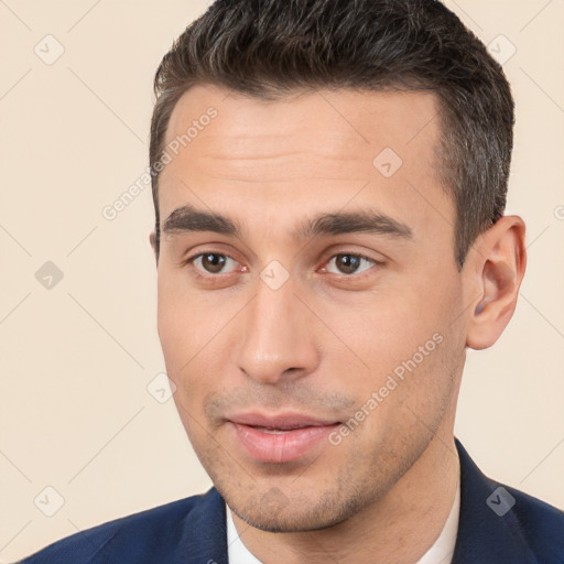 Joyful white young-adult male with short  brown hair and brown eyes