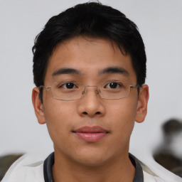 Neutral asian young-adult male with short  brown hair and brown eyes