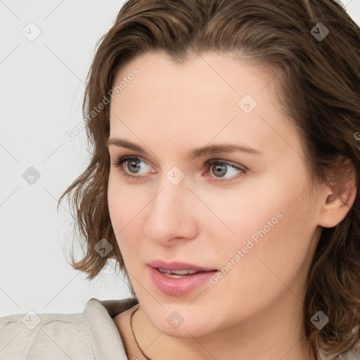 Neutral white young-adult female with medium  brown hair and brown eyes