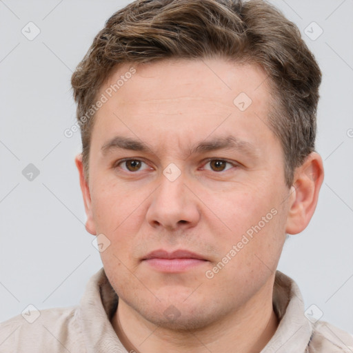 Neutral white young-adult male with short  brown hair and grey eyes