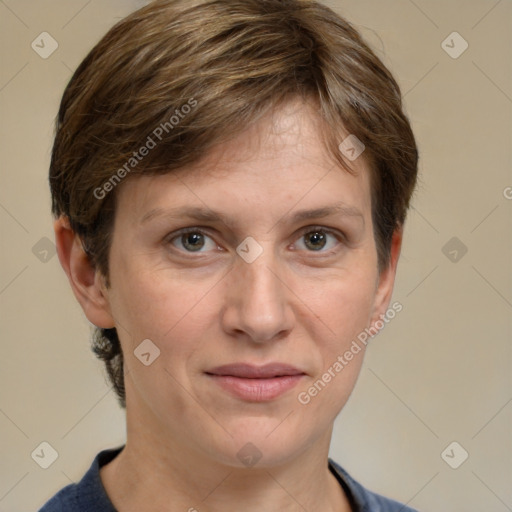 Joyful white adult female with medium  brown hair and grey eyes