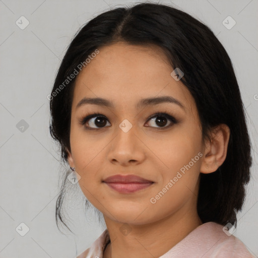 Joyful asian young-adult female with medium  black hair and brown eyes