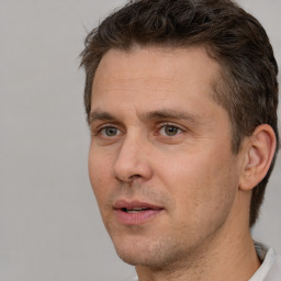 Neutral white adult male with short  brown hair and brown eyes