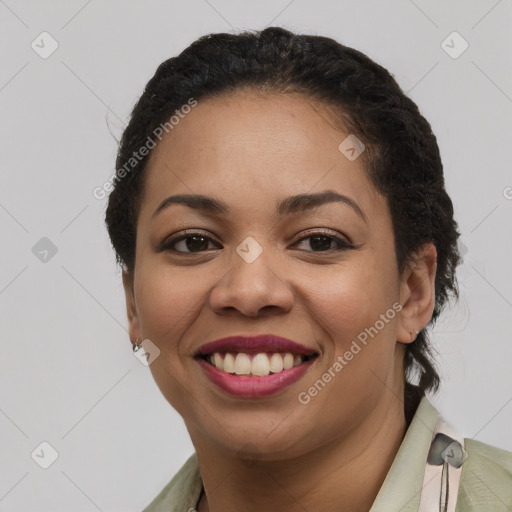 Joyful latino young-adult female with short  brown hair and brown eyes