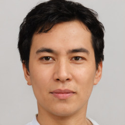 Neutral asian young-adult male with short  brown hair and brown eyes