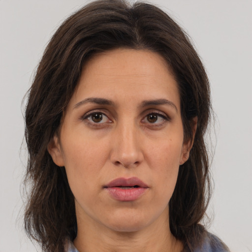 Neutral white adult female with medium  brown hair and brown eyes