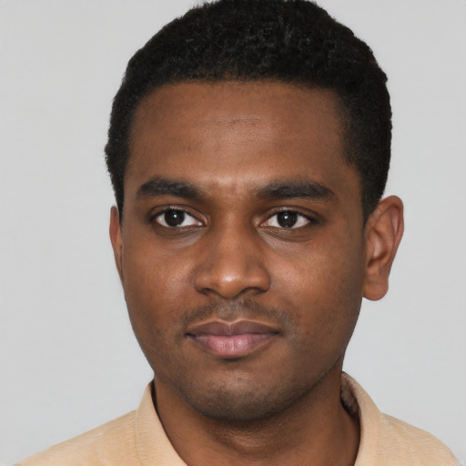 Neutral black young-adult male with short  black hair and brown eyes