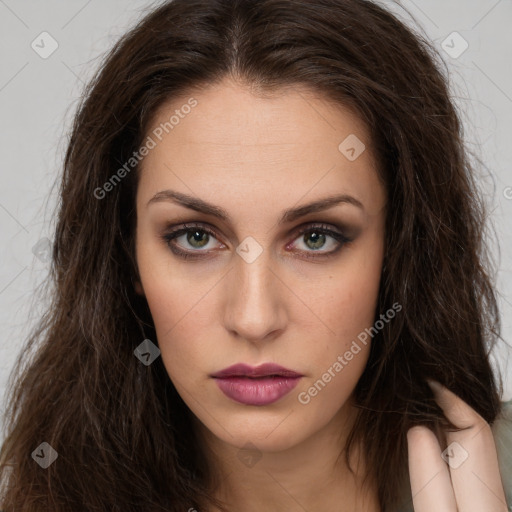 Neutral white young-adult female with long  brown hair and brown eyes