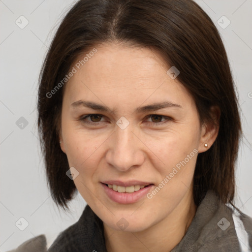 Joyful white adult female with medium  brown hair and brown eyes