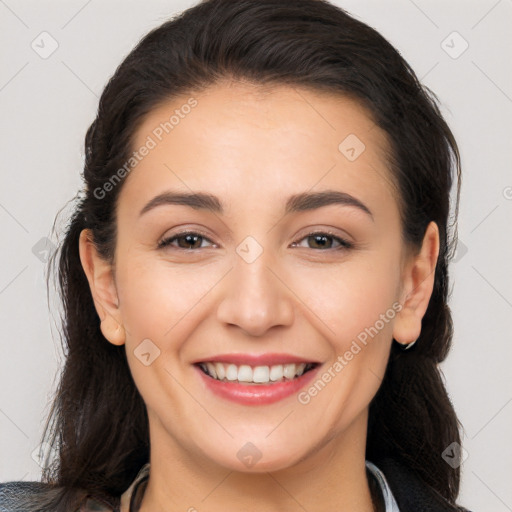 Joyful white young-adult female with medium  brown hair and brown eyes