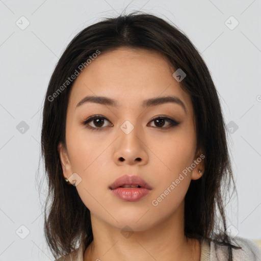 Neutral asian young-adult female with medium  brown hair and brown eyes