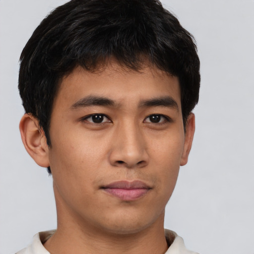 Neutral asian young-adult male with short  brown hair and brown eyes