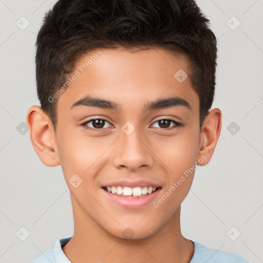 Joyful white child male with short  brown hair and brown eyes