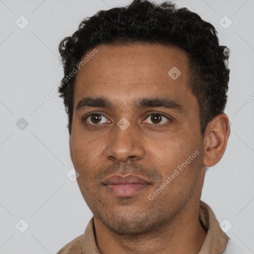 Neutral black young-adult male with short  black hair and brown eyes