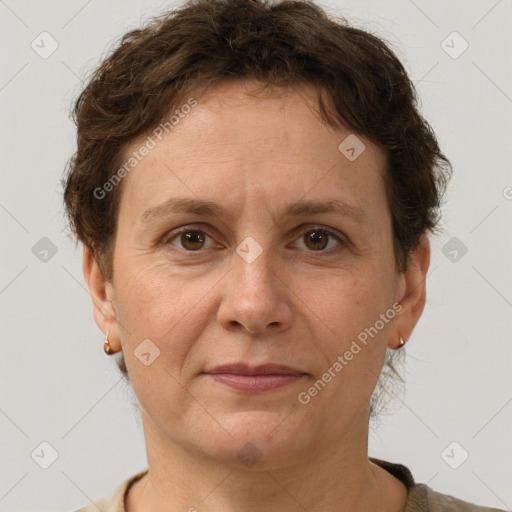 Joyful white adult female with short  brown hair and brown eyes